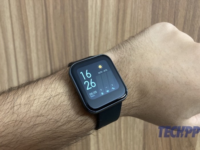 Realme Watch vs Mi Band 4: Is it Worth Paying Extra? - realme watch in hand