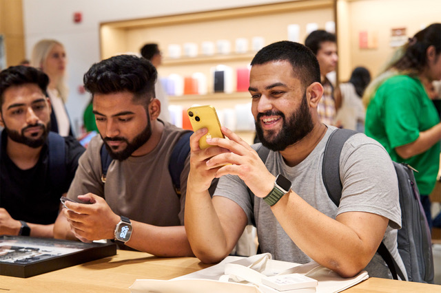 the apple store: a few dollars more? love actually! - apple saket delhi india opening day customer with iphone 14