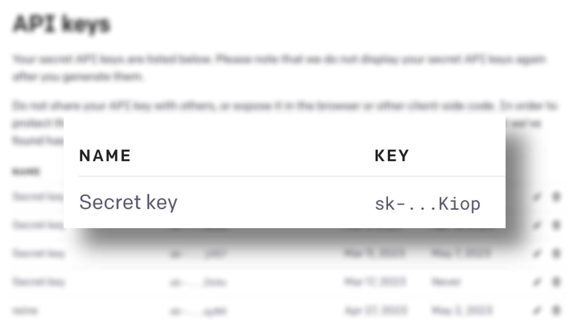 该图像显示了一个 API 密钥的示例，其中显示了名称、密钥和密钥。全文：API 密钥——名称 KEY 秘密密钥 sk -... Kiop