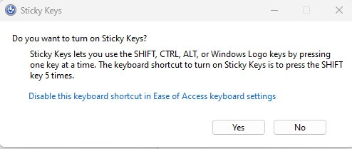 prompt meminta Anda untuk mengaktifkan Sticky Keys