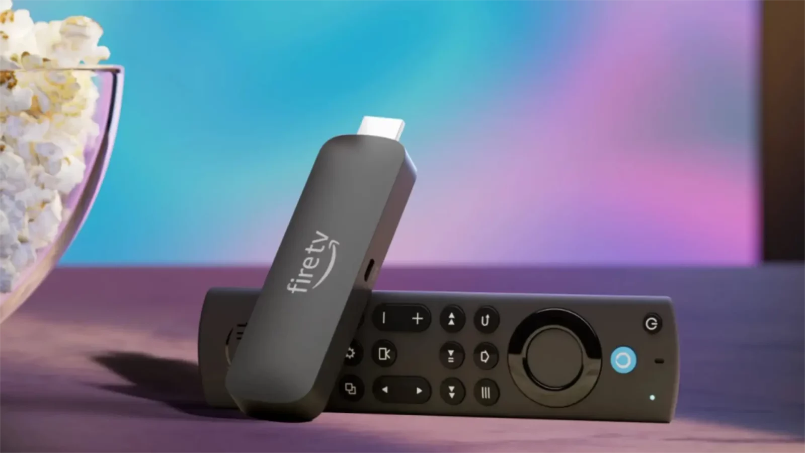 Amazon fire tv stick 4k max second gen on a table next to popcorn