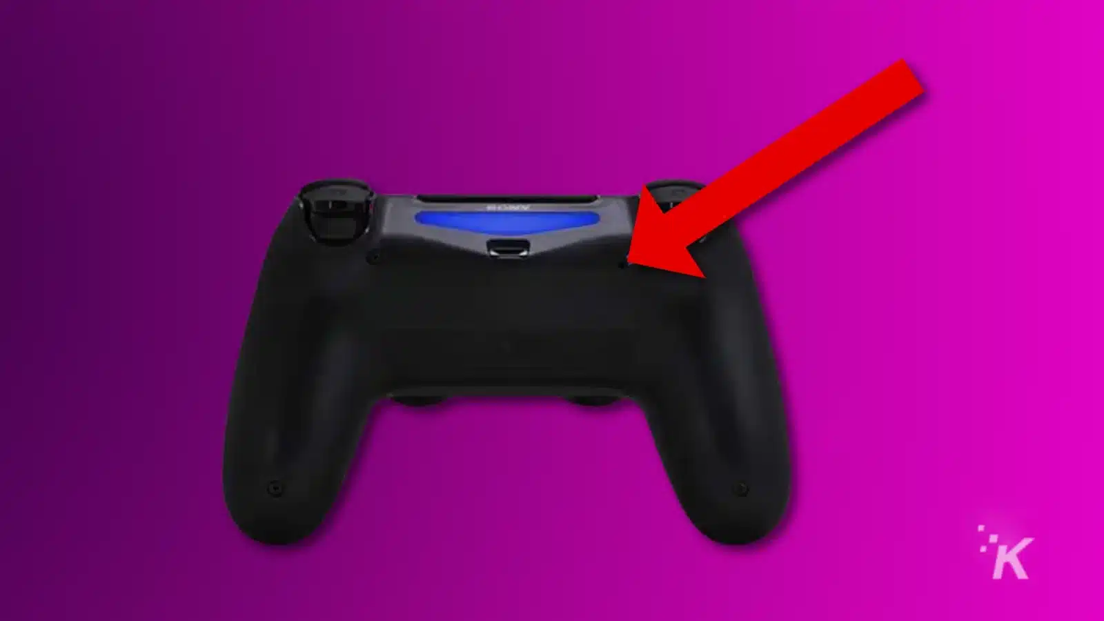 Rear view of dualshock 4 controller with the reset button highlighted