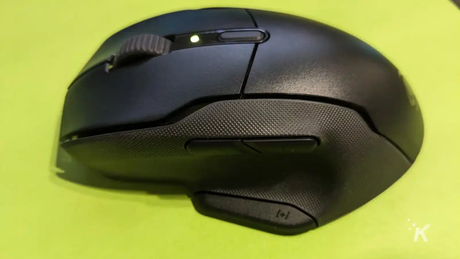 Roccat kone air wireless mouse on a yellow-green background