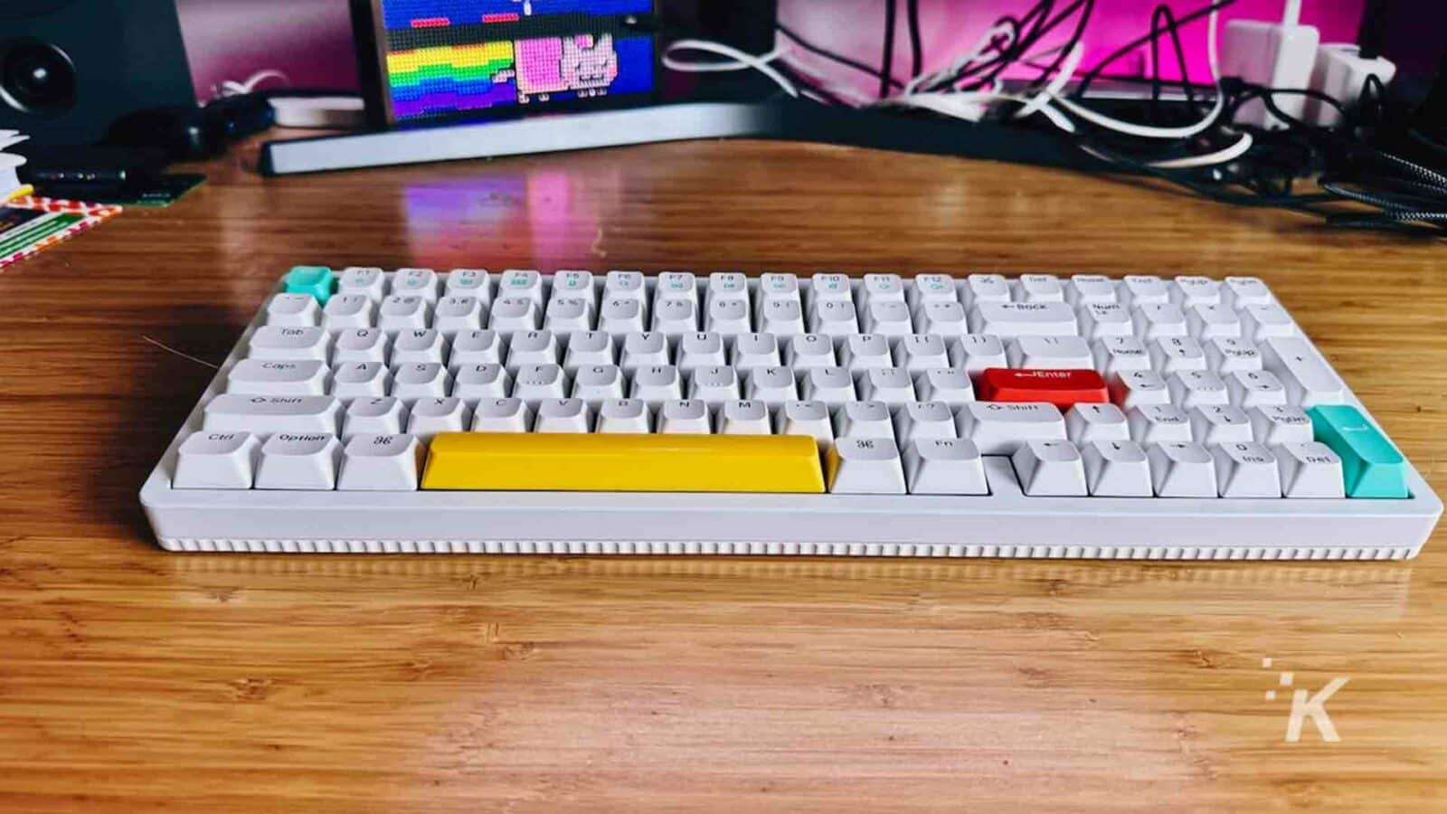 Nuphy halo96 mechanical keyboard on wooden desk.