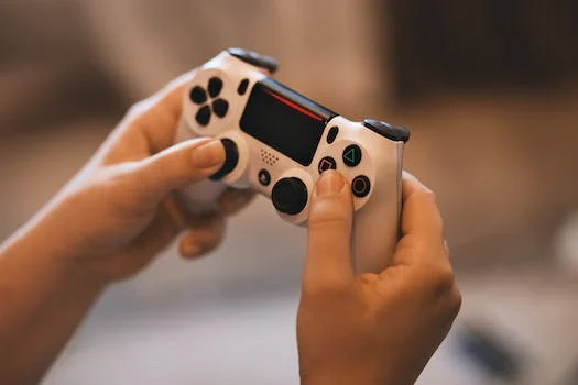 A person holds a game controller.