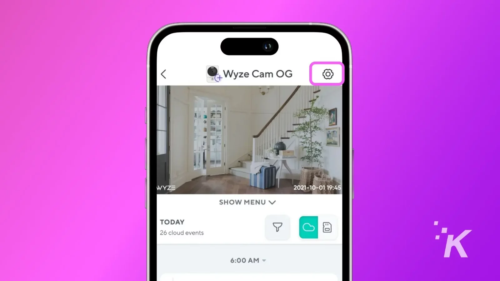 A smartphone displaying the wyze app interface with a live camera feed of a cozy interior space, featuring a staircase and french doors, at 19:45.