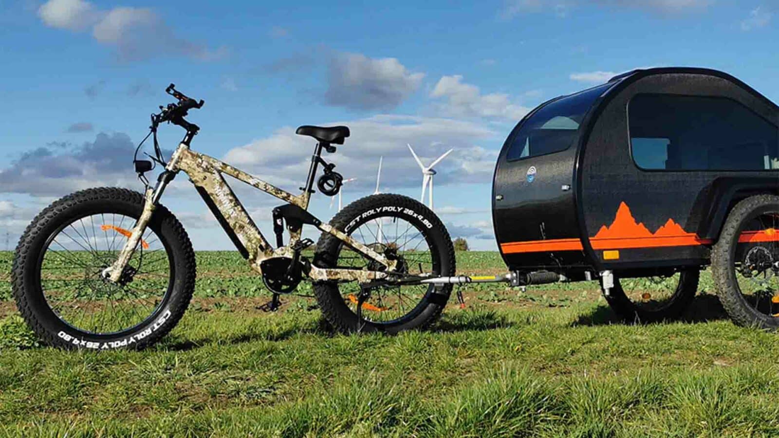 Bicicleta de montaña eléctrica Himiway llamada cobra con remolque adjunto al aire libre