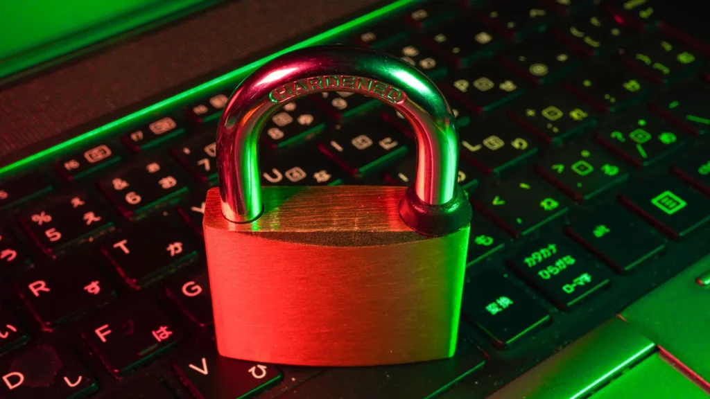 Attack surface and management lock on top of a computer keyboard