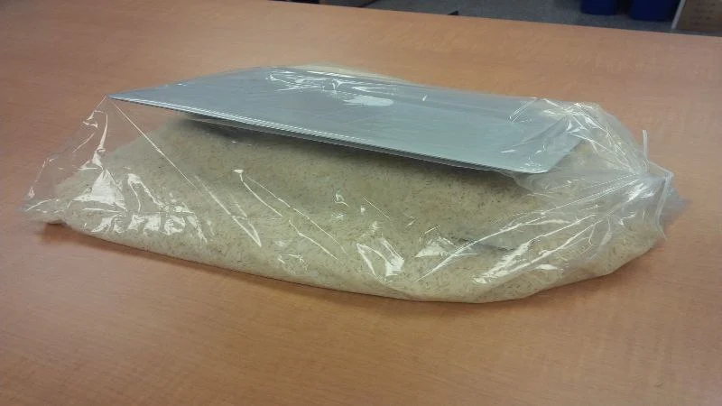 macbook in a bag of rice