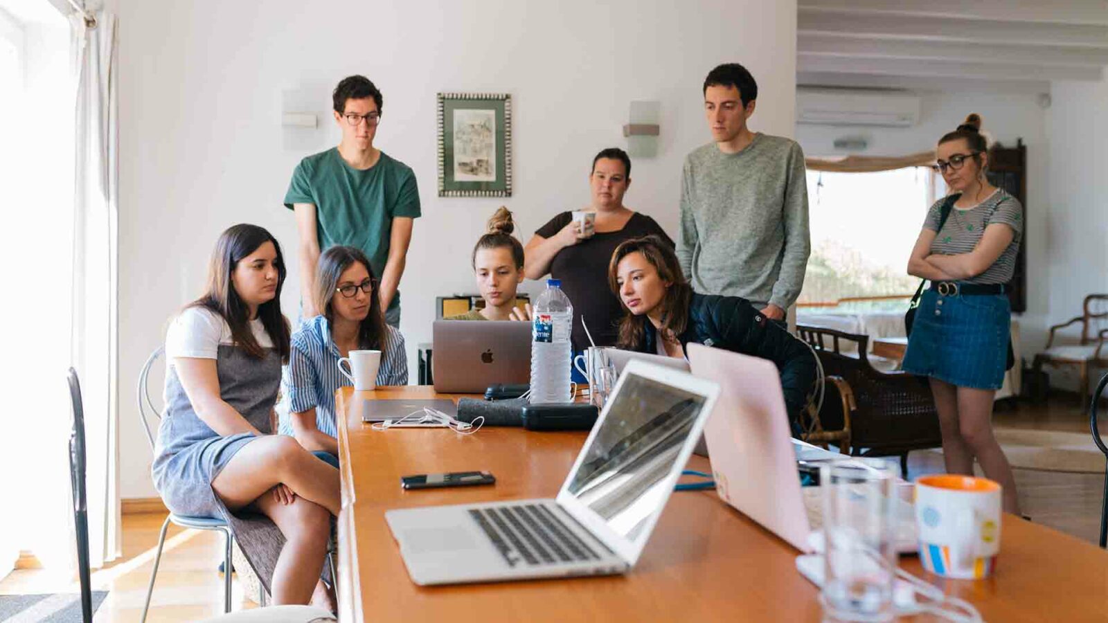 People gather in the room. Software development workers