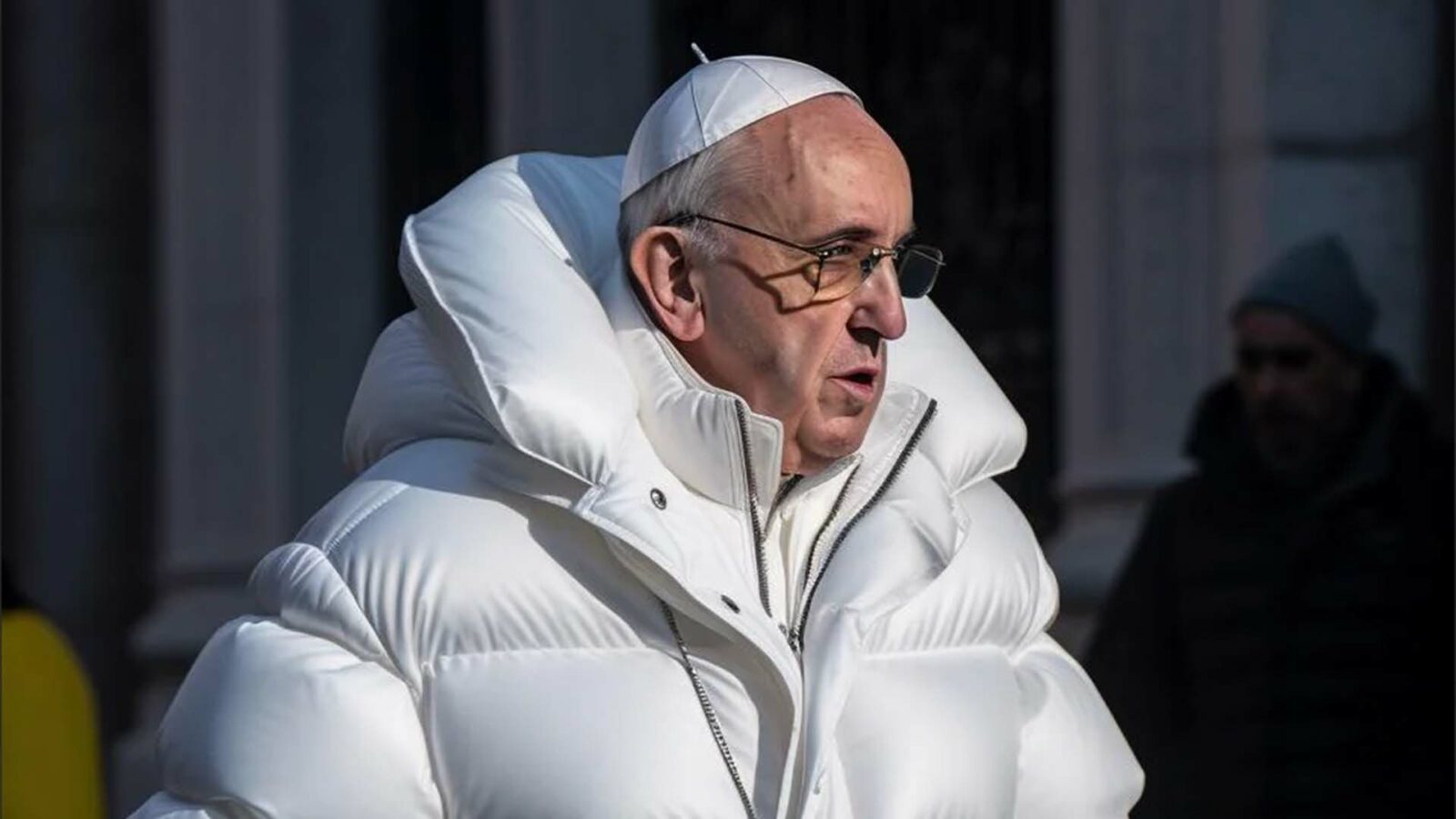 Pope deepfakes vestindo uma jaqueta branca e um solidéu branco.