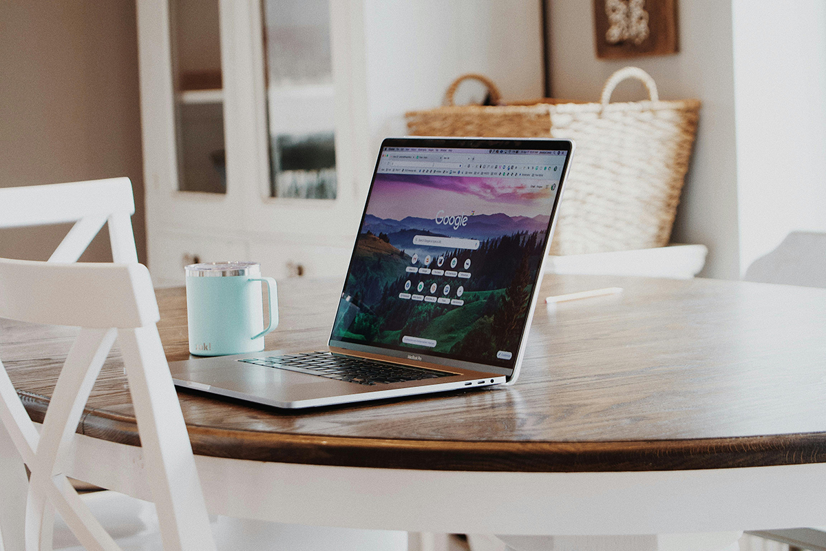 Laptop on wooden table